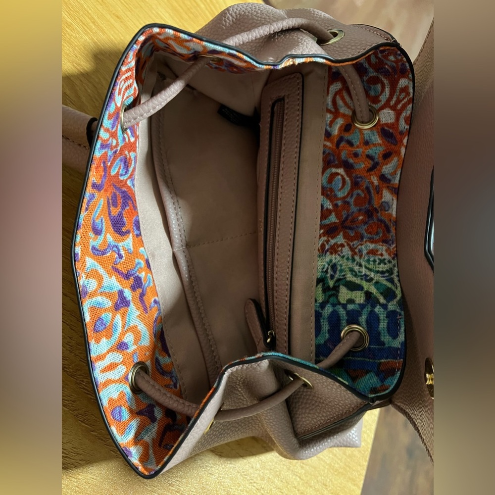Backpack in pink and wallet